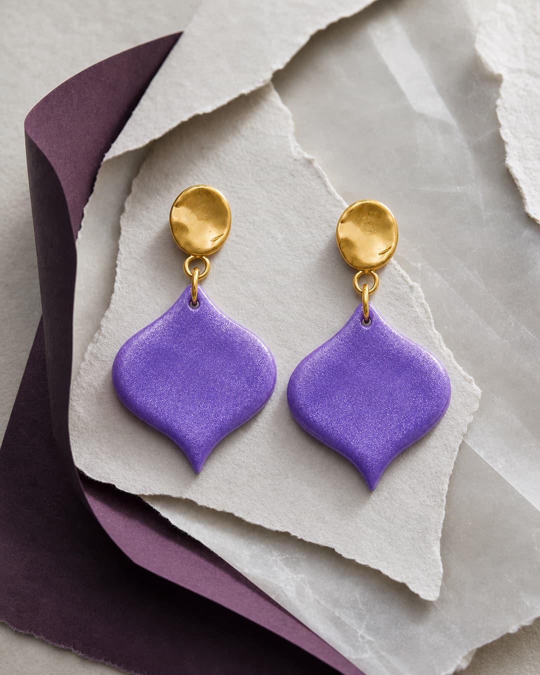 Violet Petal Dangles on torn paper