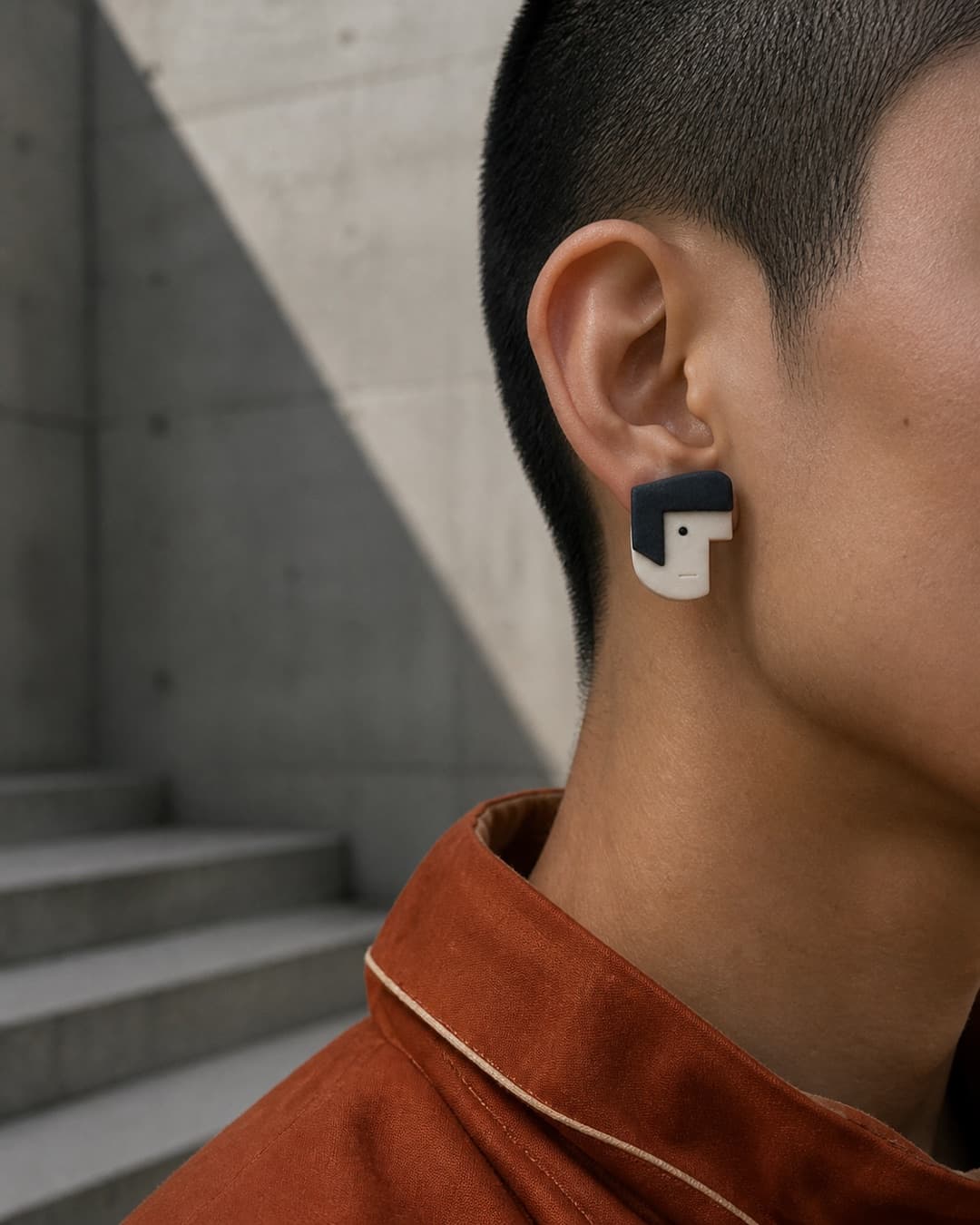 Navy Bob Studs worn at natural scale
