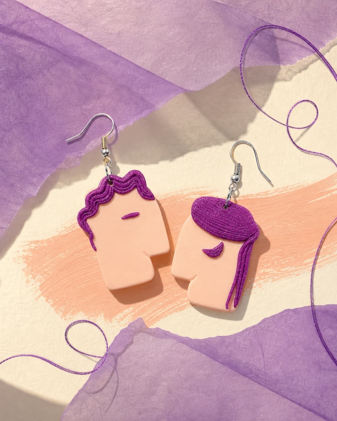 Purple Bob Profile Dangles in a paper choreography still life
