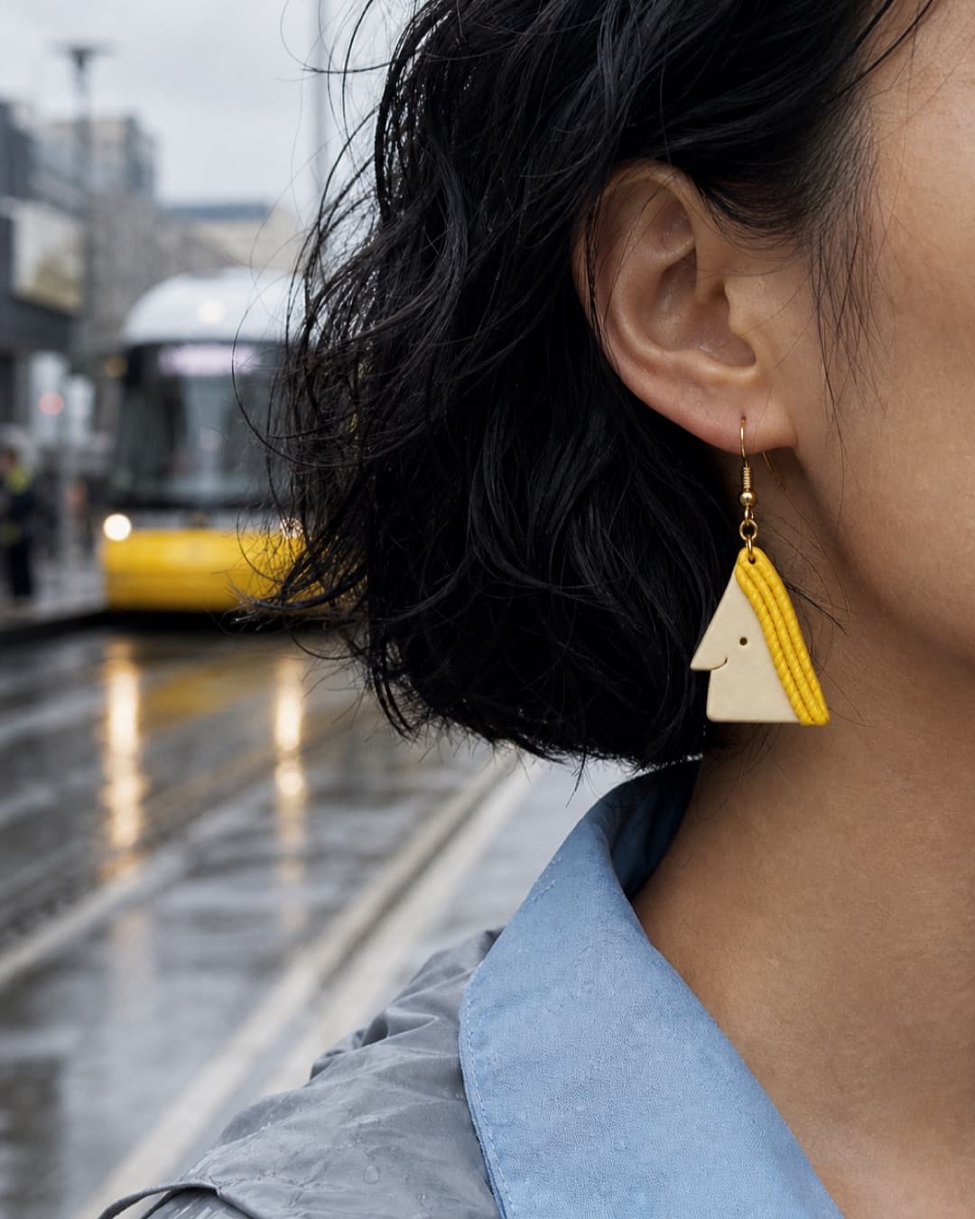 Yellow Triangle Face Dangles worn at natural scale